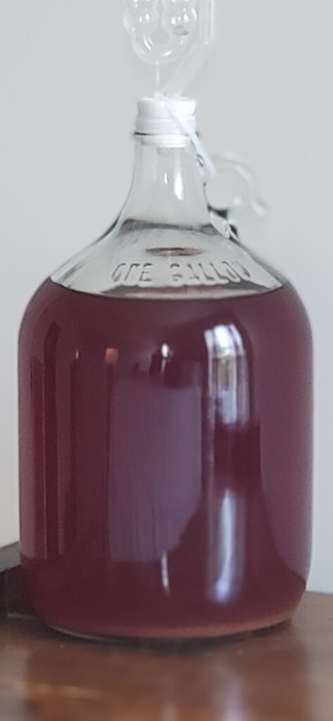 A glass carboy is perfect for bulk aging something like this raspberry mead for several months