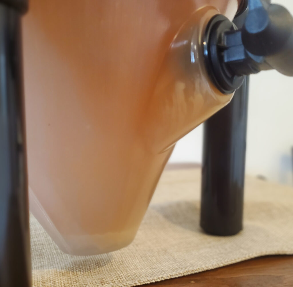 The cone does seem to trap sediment, but be sure to tilt your BrewDemon a bit so yeast doesn't collect around the spigot