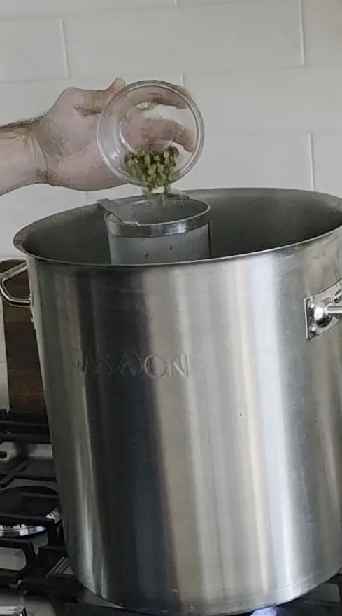 Boil for 60 minutes, adding your bittering, flavor, and aroma hop additions at the correct intervals.